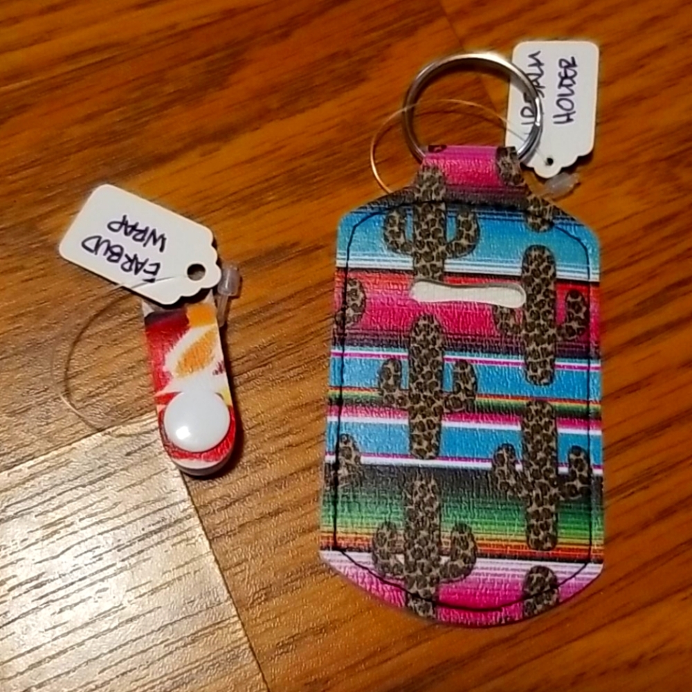 Ear bud wrap lip gloss holder